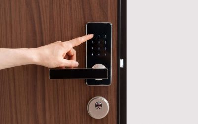Person presses a button, enter pass code on digital lock with keypad. Digital technology, keyless system in hotel, privacy and security concepts