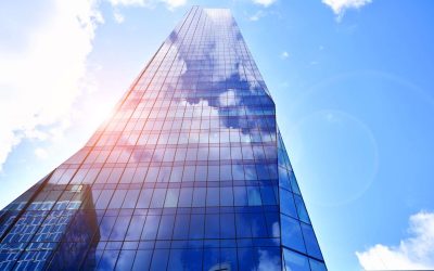 Modern sustainable glass office buildings. Exterior view of corporate headquarters glass buildings architecture.Glass windows in energy-efficient buildings. Financial business center buildings. Modern sustainable glass office buildings. Exterior view of corporate headquarters glass buildings architecture.Glass windows in energy-efficient buildings. Financial business center buildings.