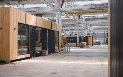 Newly built single storey prefabricated modular building. Prefabricated mobile wooden house at construction site.