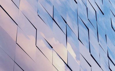 View of the clouds reflected in the glass office building. 3d rendering